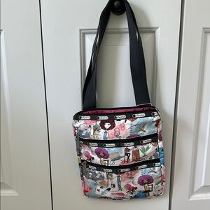 Lesportsac Black Crossbody / shoulder Bag with Multi-Compartment Design